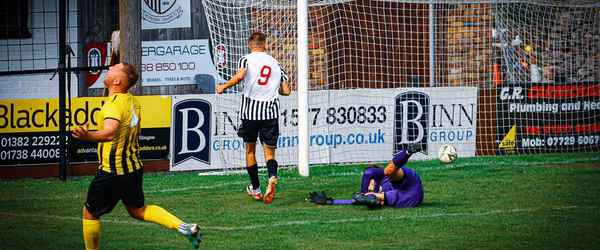 Sharp double gives Burgh a major boost up the table