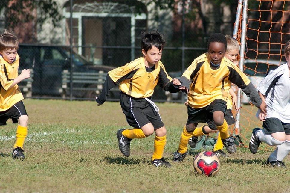 boys playing grassroots football